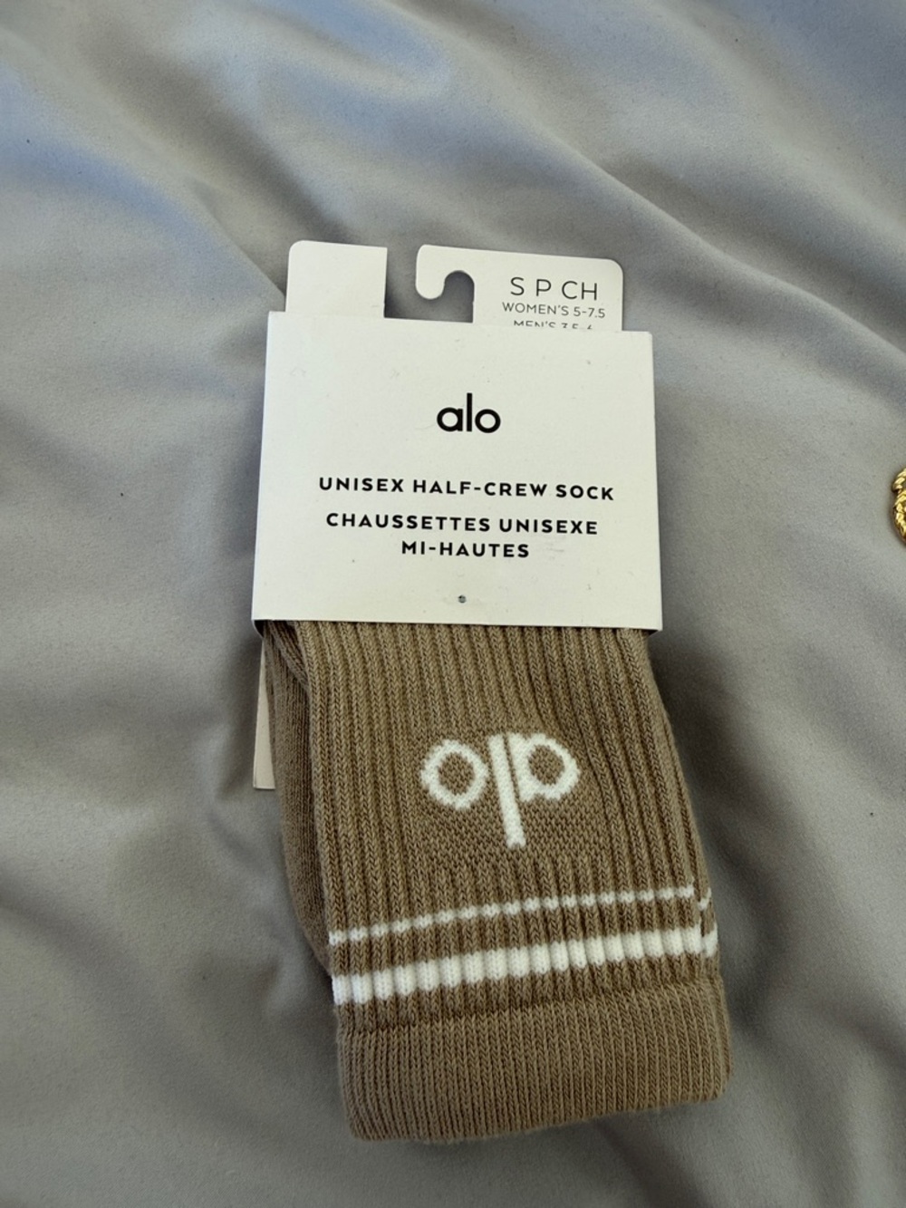 ALO Yoga unisex Half-Crew Athletic Socks in Brown with White Stripe